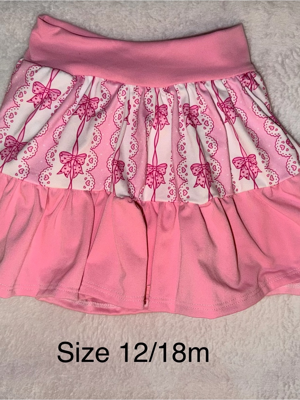 Handmade Pink Bow-Print Tiered Skirt with attached shorts underneath.